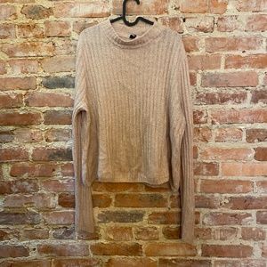 Soft pink knit sweater